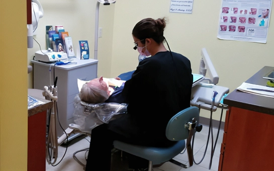 Dentist Parma Heights OH Dental Hygienist With Patient In Chair Dentist Parma Heights OH Dental Hygienist With Patient In Chair
